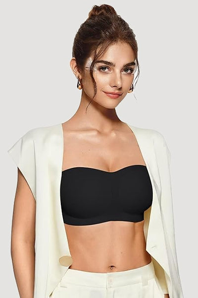 A woman wearing a black vertvie strapless bra.