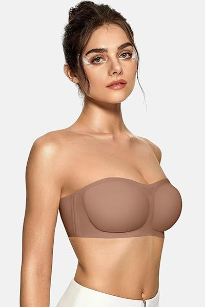 A woman wearing a vertvie coffee colored strapless bra.