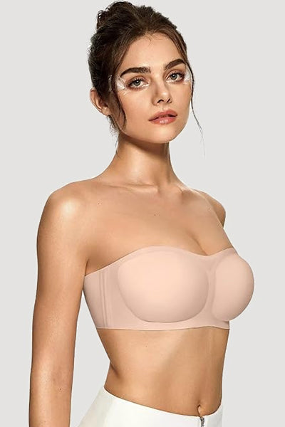 A woman wearing a nude vertvie strapless bra.