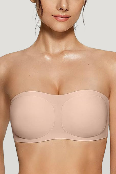 A woman wearing a nude vertvie strapless bra.