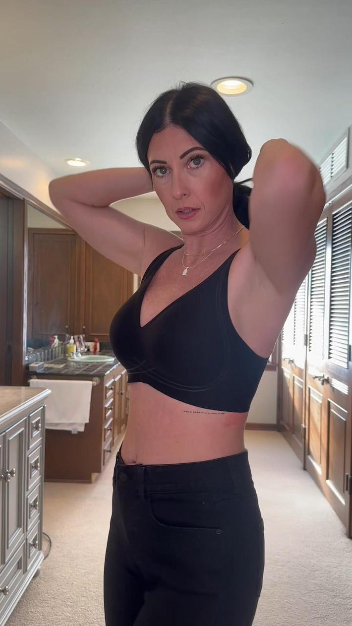 Customer wearing a black support bra